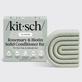 A KITSCH Rosemary & Biotin Volumizing Hair Conditioner Bar 2.7 oz rests beside its box, which is labeled for fine, limp, and delicate hair types. The pale green bar displays a geometric arched pattern, while the packaging emphasizes benefits suited for anyone seeking a lightweight rosemary biotin conditioner to boost body and volume in fine hair.