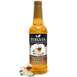 A bottle of Syruvia French Vanilla Coffee Syrup with real cane sugar, gluten-free, features a label with a coffee drink and vanilla flowers plus extra vanilla flowers at the base.
