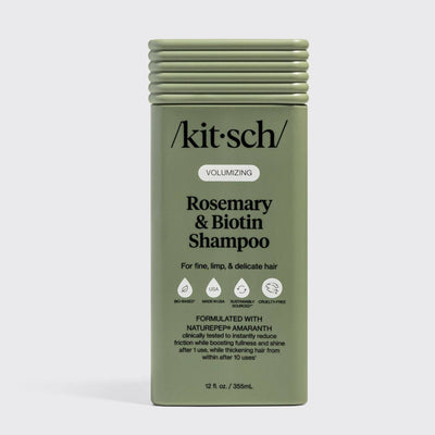Olive green bottle of Kitsch Hair: Volumizing Rosemary & Biotin Shampoo 12oz for fine, limp, and delicate hair, featuring nourishing biotin and rosemary with certification icons and product details on the front label.