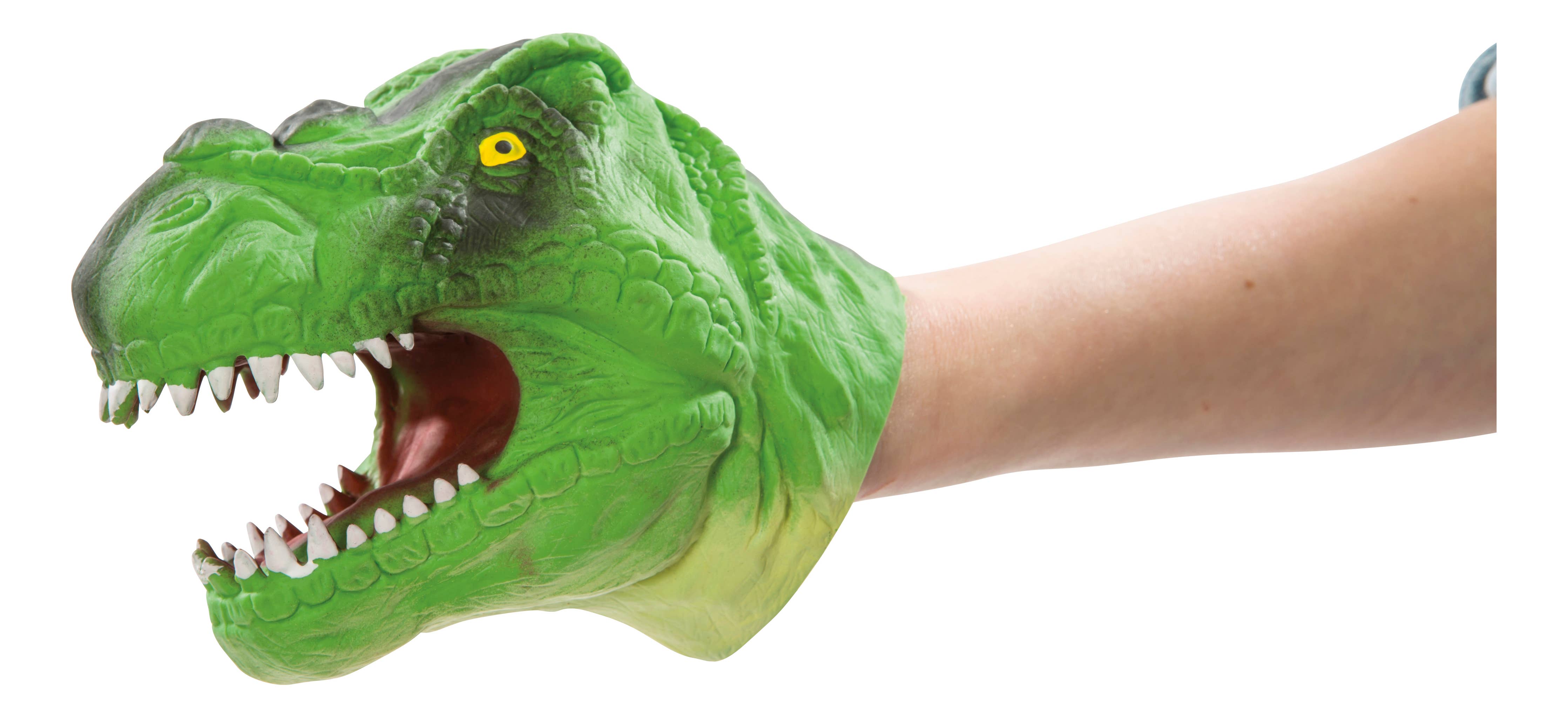 The Dino Bite! Hand Puppet in green, featuring a T-rex design with sharp teeth, is worn on a person's arm and vividly displayed against a white background.