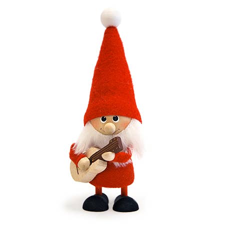 This handcrafted Scandinavian figurine, named Santa Gnome Playing Guitar, showcases a charming gnome with a long red hat and white beard, strumming a guitar.