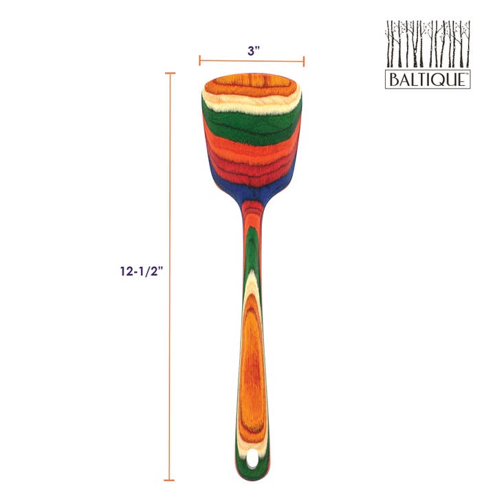 Introducing the Marrakesh Collection Spatula by Baltique, made from durable layered birch. This utensil features a vibrantly colored wooden design with a 12.5-inch long handle and a 3-inch wide scoop, showcasing eye-catching stripes of orange, red, green, and blue. The Baltique brand is elegantly displayed in the top right corner.