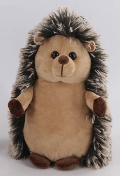 The Plush: Wild Onez Hedgehog 8" stands upright against a light background, featuring a tan face and belly, dark eyes, a small brown nose, and spiky black and beige fur on its back—ideal for kids who love stuffed animals.