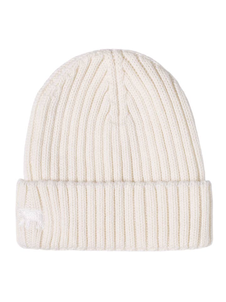 A stylish cream ribbed knit beanie, the Rib Beanie White is crafted in Norway from 100% new wool, featuring a folded cuff and small embroidered animal logo, blending quality craftsmanship with timeless design.