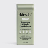 A green rectangular bottle of Hair: Volumizing Rosemary & Biotin Conditioner 12 fl oz, designed for fine, limp, and delicate hair. Enriched with rosemary and biotin to help thicken hair.