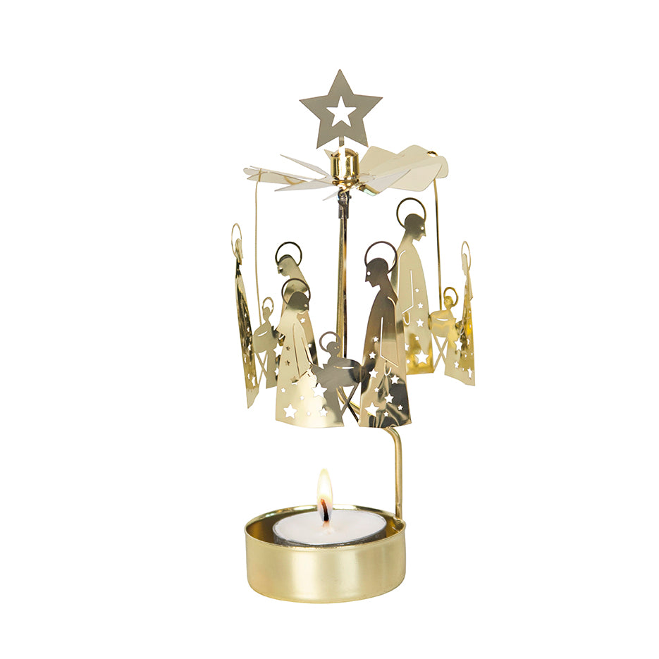 The Candle Holder: Pluto Design Angel Chime Crib Family - Nativity Family Gold, imbued with Christmas holiday tradition, features a lit tealight beneath that sets the angels in motion.