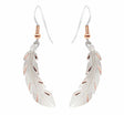 The Copper Feather Silver Plated Textured Earrings feature a metallic finish, hook fastenings, and gold accents—perfect handmade earrings to add a unique touch to any look.
