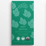 Chocolate bar in a green wrapper with leaf art, labeled “STED Mint Mocha 50% Dark Milk Chocolate,” and showing USDA Organic certification.