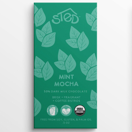 Chocolate bar in a green wrapper with leaf art, labeled “STED Mint Mocha 50% Dark Milk Chocolate,” and showing USDA Organic certification.