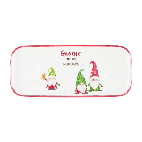 Rectangular melamine tray with red trim, three gnomes wearing winter hats, and the phrase “Gnome for the Holidays” in red and gray lettering.