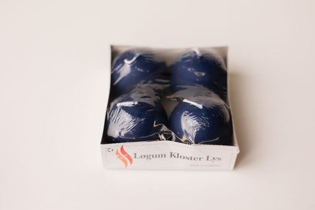 A pack of four 2.5" ball candles by Talla Imports, labeled "Logum Kloster Lys"—ideal for bringing classic Scandinavian décor to your home.