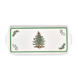 Rectangular melamine tray with a green border, a Christmas tree in the center, and small holly sprigs in each corner.