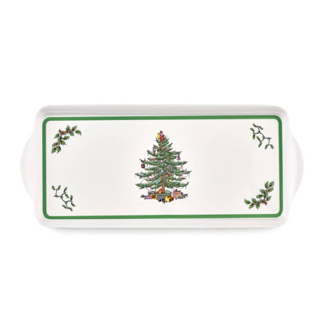 Rectangular melamine tray with a green border, a Christmas tree in the center, and small holly sprigs in each corner.