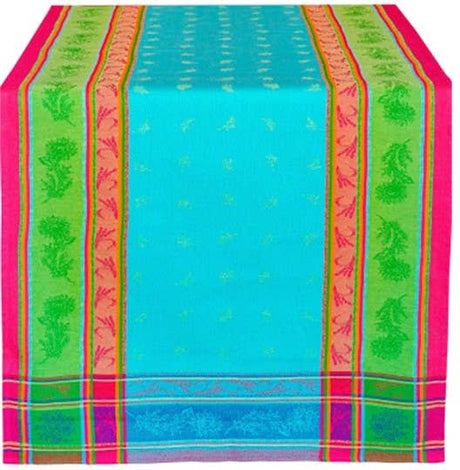 The Runner: Turquoise Table Runner is European-made, 100% woven cotton, with traditional jacquard weaving and intricate leaf patterns in blue, pink, and green stripes. Size: 20"x60".