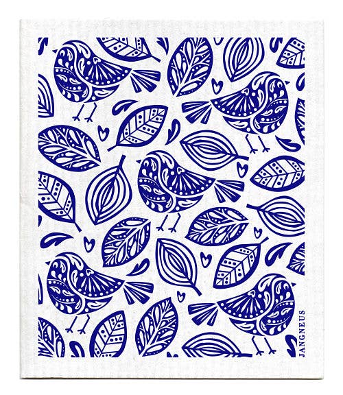 The Dish Cloth: Robins Blue showcases a Scandinavian-style design with a blue and white pattern of stylized birds, leaves, and hearts on a square. These beautiful sponge cloths are perfect for adding charm to any kitchen and are biodegradable as well.