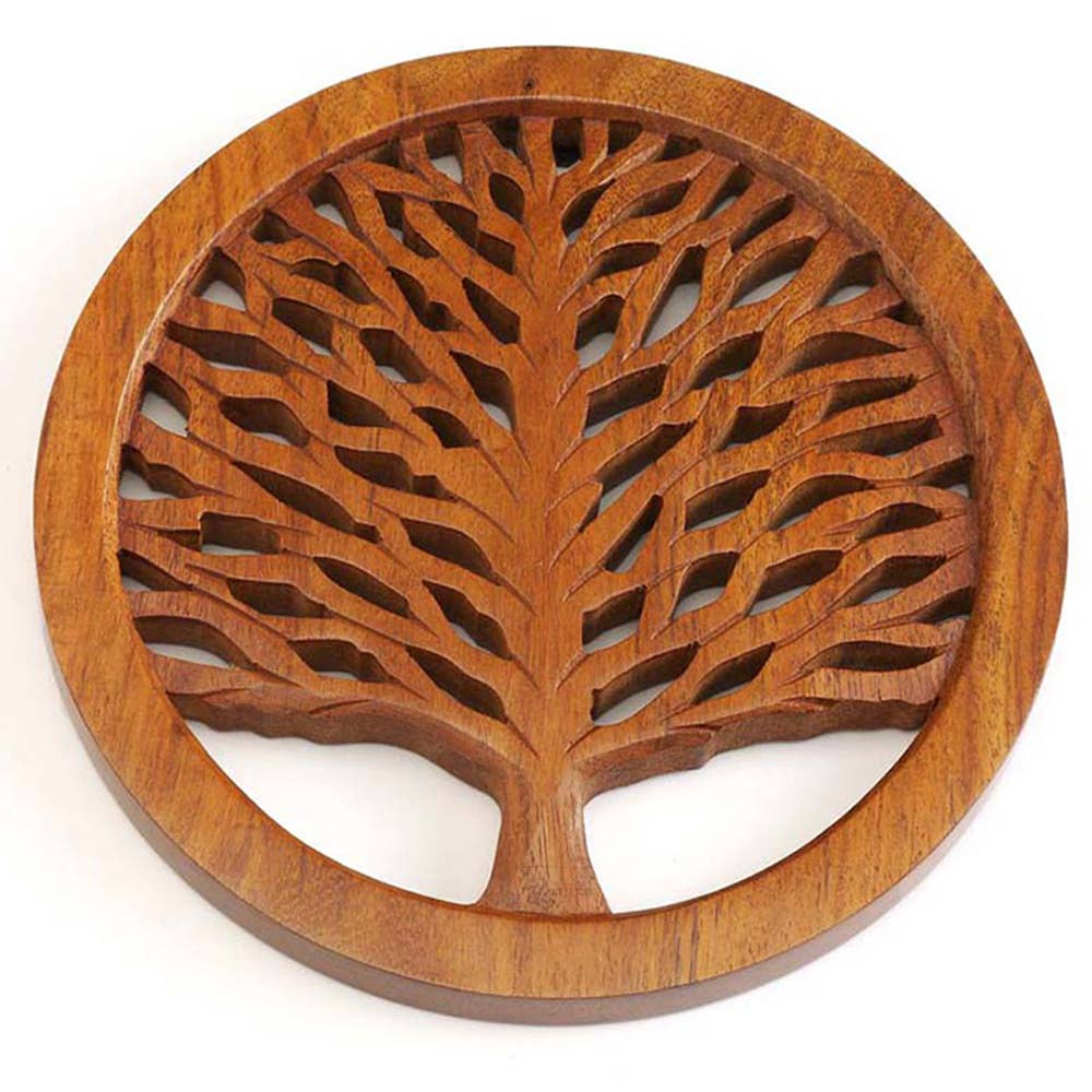 Handcrafted circular wooden trivet with intricate Tree of Life design and branching limbs, called Tree of Life Laser Cut Wood Trivet.