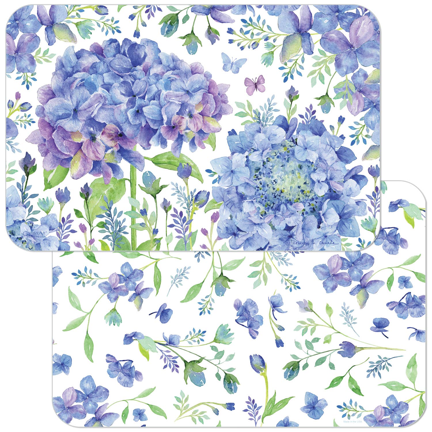 The Beautiful Hydrangea Reversible Rectangular Plastic Placemat showcases gorgeous purple and blue hydrangeas with green leaves set against a white backdrop. Made from BPA-free plastic, it combines elegance with easy maintenance, making it an ideal centerpiece for your dining table.