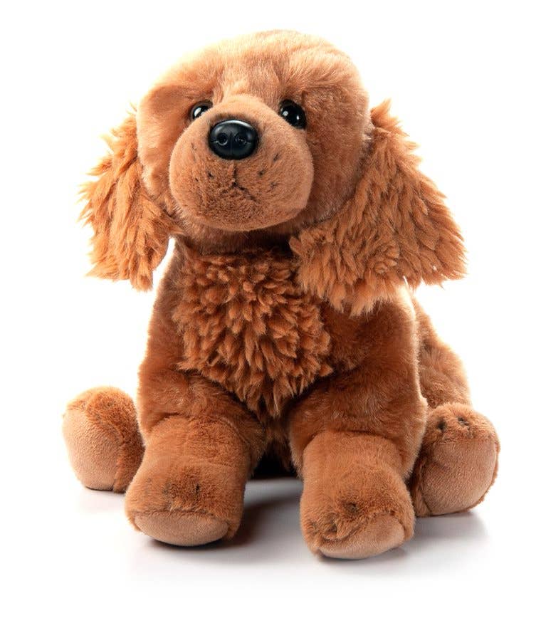 This plush brown dog, with floppy ears and a black nose, resembles a golden retriever and sits upright against a white background. It is the 12" Plush: Golden Retriever Dog.