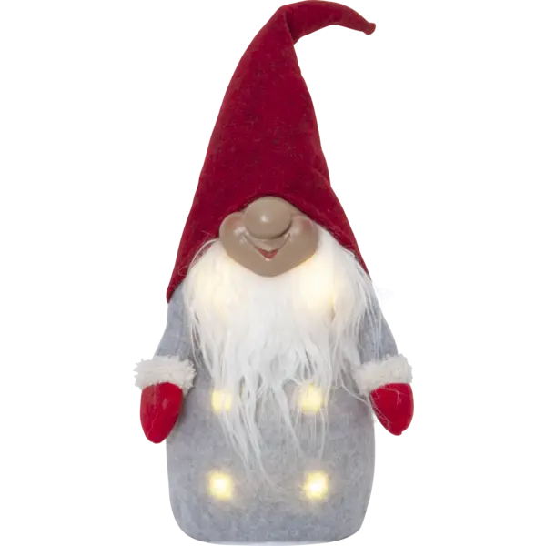 The "Lighted Tomte Standing Red" figurine features a long white beard and red hat, evoking a Santa Claus-like appearance, and is dressed in a gray outfit decorated with small LED lights.