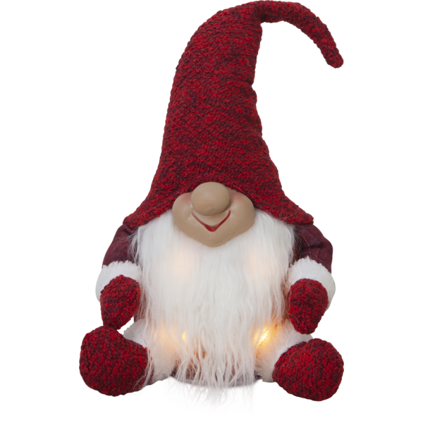 The **Figurine: Light up Tomte Sitting Red** is a plush gnome that resembles a classic Tomten, complete with a long white beard and a large red hat, and it sits cozily while its LED-lit hands and feet cast a warm glow.