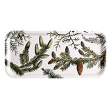 The Tray: Pine Trees is a 6x12 inch white wood serving tray, made in Sweden for Koustrup Co, featuring illustrations of pine branches, pinecones, and evergreen foliage.