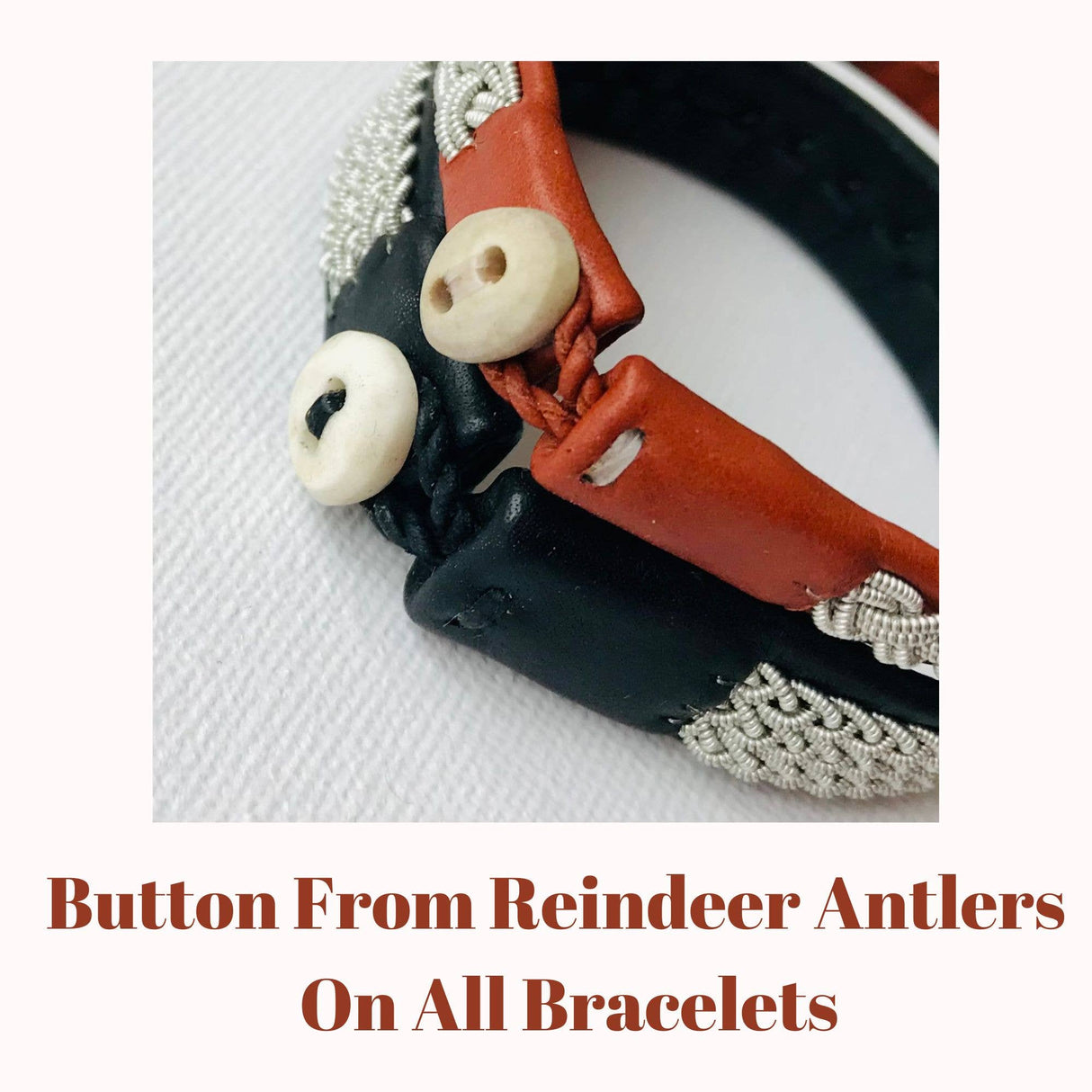 Close-up of two Traditional Sami Bracelet #5B, handmade from black reindeer leather with pewter and silver thread. Each bracelet features a button made from reindeer antlers. Text reads: Button From Reindeer Antlers On All Bracelets.