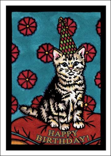 A tabby cat in a party hat sits on a cushion amid red flowers, with the words "Happy Birthday!" at the bottom, designed in Sarah Angst's unique style, making it ideal for whimsical greeting cards. The product is called "Greeting Card: Birthday Kitten by Sarah Angst.