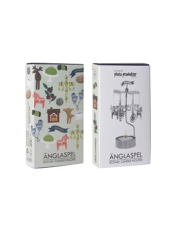 Two boxes of "Candle Holder: Like a Swede Rotary Candle Holder"; one featuring delightful festive illustrations, the other proudly displaying an image of the classic product. These charming pieces, made in Sweden, bring a touch of Nordic elegance to any setting.