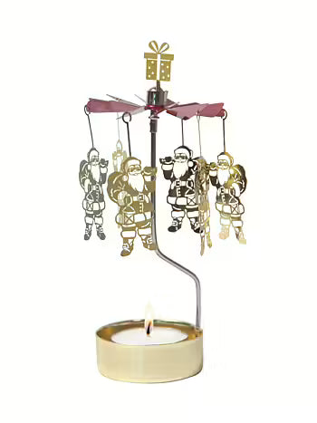 Gold-tone metal rotary candle holder with hanging Santa Claus figures and a gift topper, designed to spin above a tealight candle.