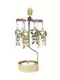 Gold-tone metal rotary candle holder with hanging Santa Claus figures and a gift topper, designed to spin above a tealight candle.