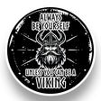 A black and white circular illustration features a bearded Viking helmet, radiating Nordic warrior energy. Text reads: Always be yourself unless you can be a Viking. This Nordic Sticker: Viking Shield is 4x4 inches, glossy, UV & water-resistant, dishwasher safe, easy peel. Buy 3 Get 1 Free.