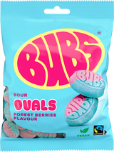 A 90g bag of Candy: Bubs Sour Foam Forest Berries Ovals from Faire - Sweet as Fudge. This vegan gummy candy comes in blue packaging with pink/yellow branding, images of sour ovals, and vegan plus Fairtrade logos at the bottom.