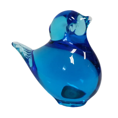 The Blue Baby Bird Swedish Blown Glass Figurine, a 1.25 handcrafted piece, exhibits a smooth surface reflecting light beautifully against a plain backdrop, showcasing exquisite Swedish artistry.