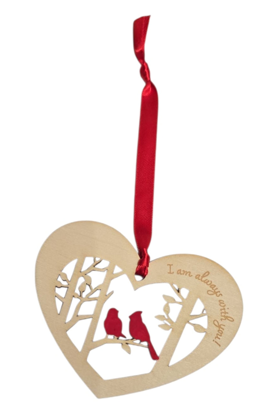 The “I Am Always with You” Heart-Shaped Ornament features two cardinals on a branch, laser-cut from birch (3.75" × 3.25")—a touching memorial ornament for any space.