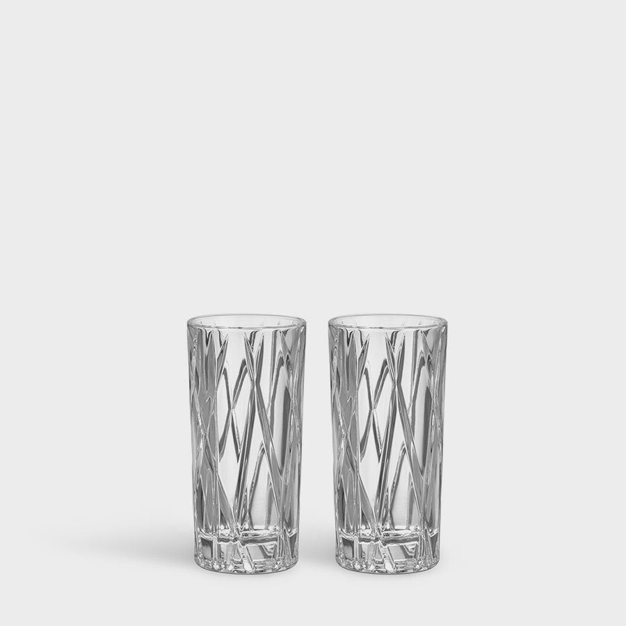 Two Orrefors City Shot Glasses, crafted in crystal, boast a stunning diamond pattern.