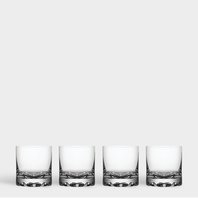 The Orrefors Erik Double Old Fashioned Glass 12oz (4-Pack) set features four pristine glasses arranged in a row on a plain background, highlighting their elegant clear glass design.