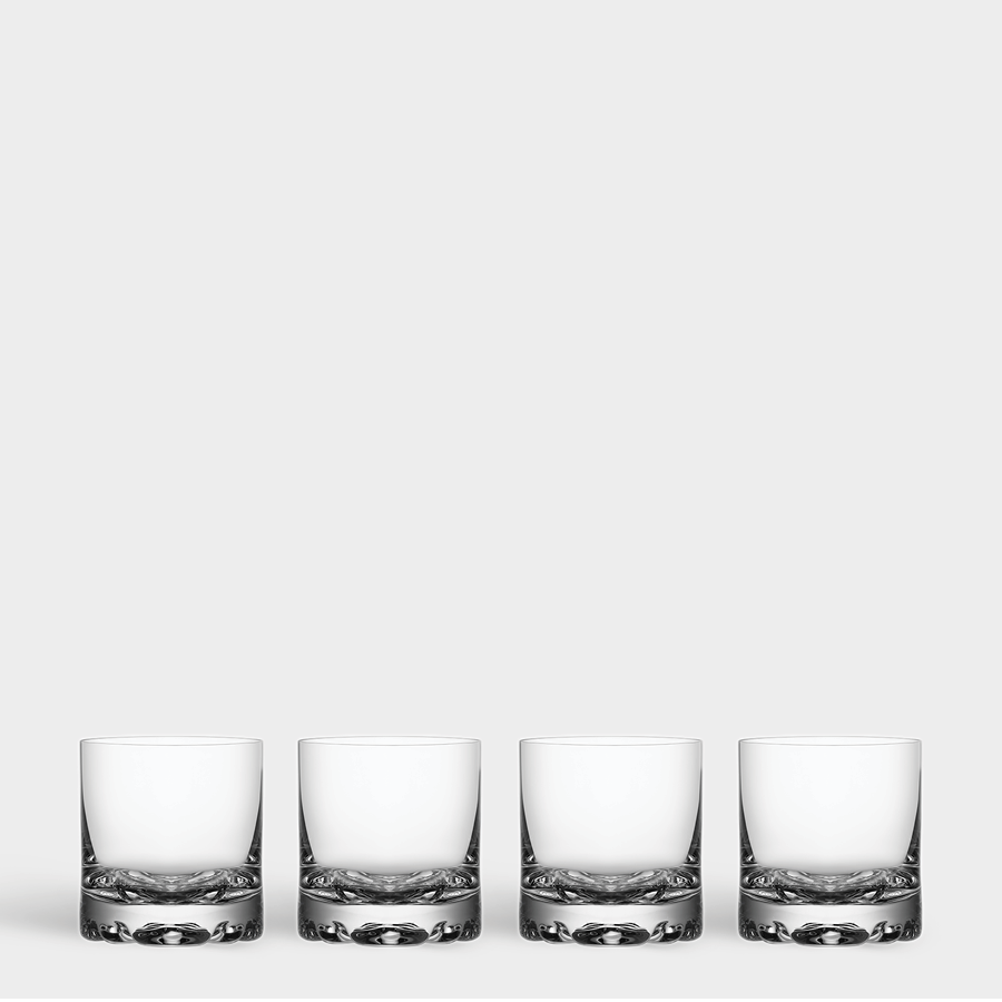 The Orrefors Erik Double Old Fashioned Glass 12oz (4-Pack) set features four pristine glasses arranged in a row on a plain background, highlighting their elegant clear glass design.