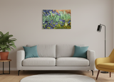 A modern living room with a gray sofa, teal pillows, a yellow armchair, potted plant, standing lamp, and the Artwork: Irises Vincent Van Gogh 1853 - 1890 Print on Canvas displayed above the sofa.