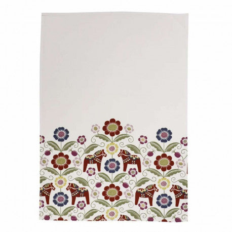 The Siljan Towel is a white, eco-friendly marvel featuring colorful flowers and maroon Dala horses at the base, perfectly blending nature and tradition.