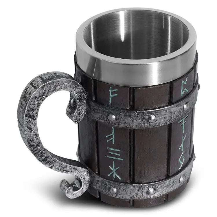 The Mugs: Runic Viking Barrel (20oz) showcases a stainless steel interior, a textured handle, and a metallic rim. Its body is designed to resemble wooden slats with engraved runes, offering a perfect blend of rustic charm and durability.