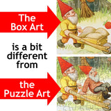 Jigsaw puzzle with two gnomes pushing wheelbarrows in a woodland setting; box and assembled puzzle show the gnomes in different positions.