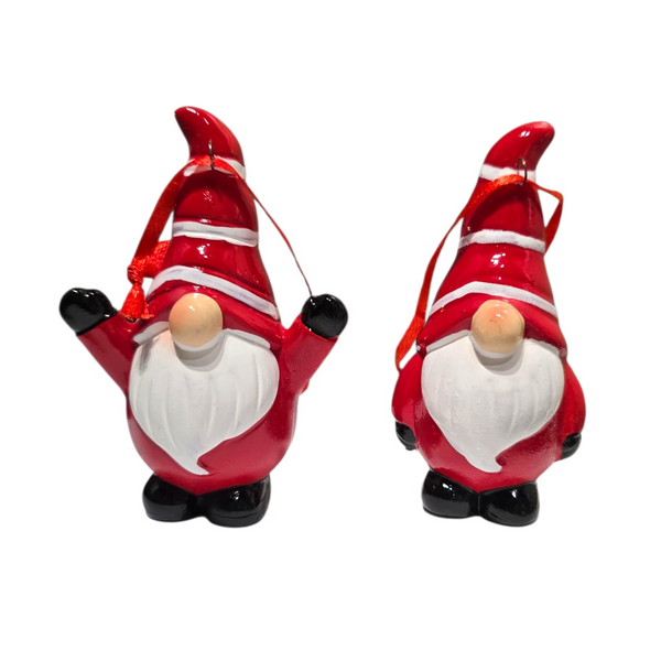 Two Santa Gnome Ceramic Christmas Ornaments, each 3.5” tall with red suits, black mittens, and boots, stand side by side—ideal for adding Scandinavian charm to your holiday décor.