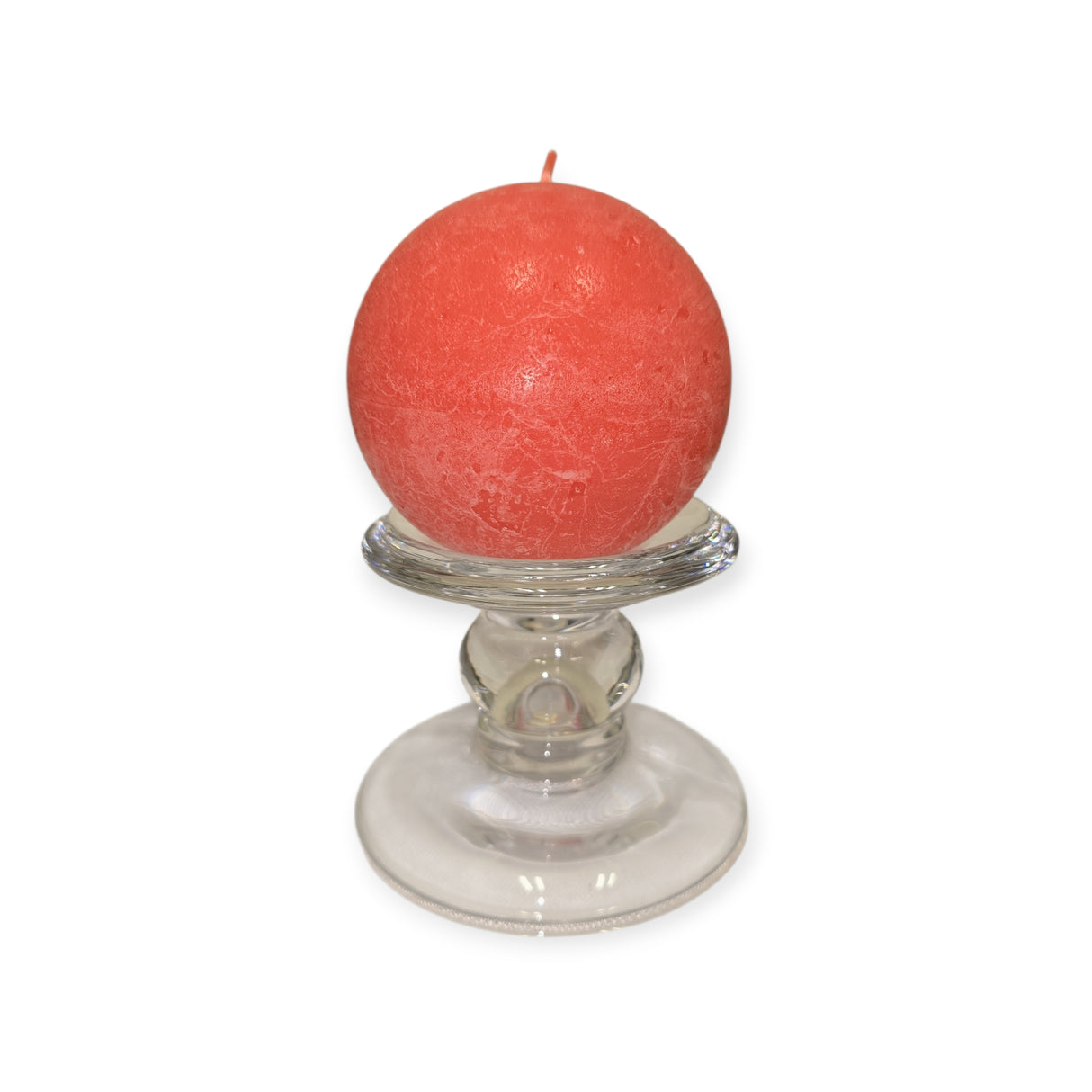 A round red candle rests on the Glass Dual-Size Reversible Candle Holder for taper, ball, or pillar candles, displayed against a white background.