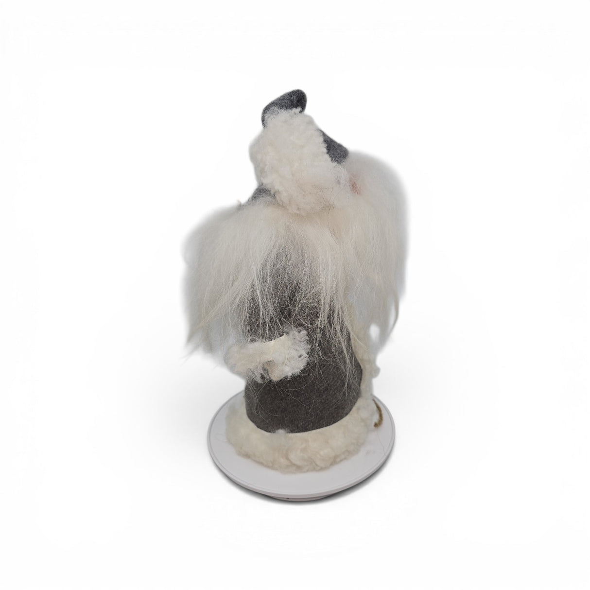 A 12" tall "Tomte with Robe" gnome figurine by Gumselids of Sweden, offered by Talla Imports, inspired by Scandinavian folklore decor. It features a white beard, gray hat and coat with white trim, and stands on a round wood base with a burlap bag accessory, viewed from the side.