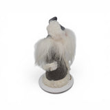 A 12" tall "Tomte with Robe" gnome figurine by Gumselids of Sweden, offered by Talla Imports, inspired by Scandinavian folklore decor. It features a white beard, gray hat and coat with white trim, and stands on a round wood base with a burlap bag accessory, viewed from the side.