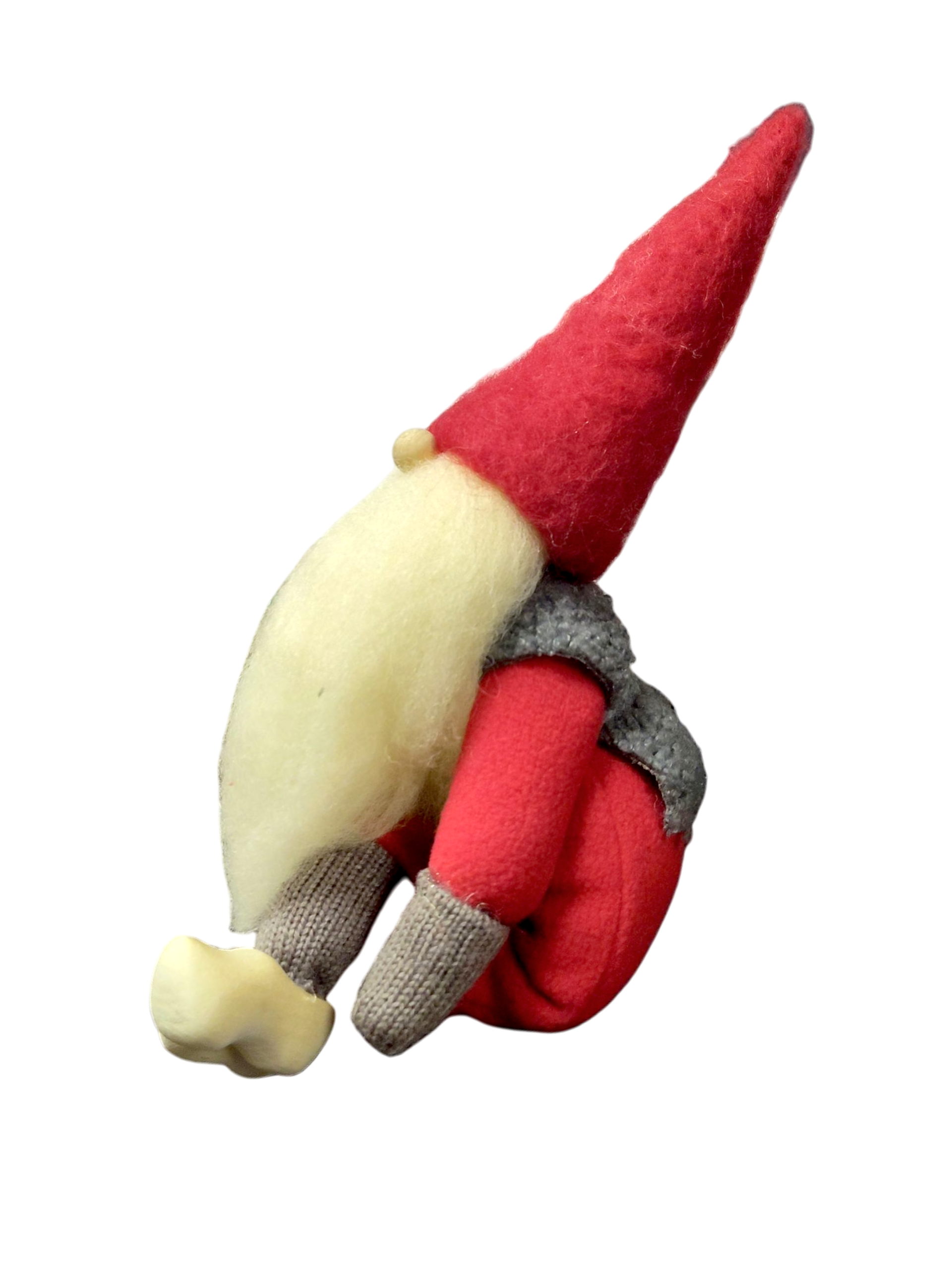 The Santa: Posable Nisse Holiday Figurine sits cross-legged with a long red hat, white beard, grey top, and red pants—perfect as cozy Scandinavian holiday décor on any plain background.