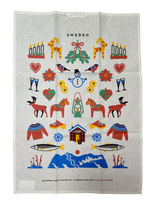 The Tea Towel: Swedish Winter Traditions—cotton/linen blend (50×70 cm)—features colorful Swedish folk motifs and “Sweden” at the top; a charming Scandinavian gift inspired by Sweden’s winter heritage.