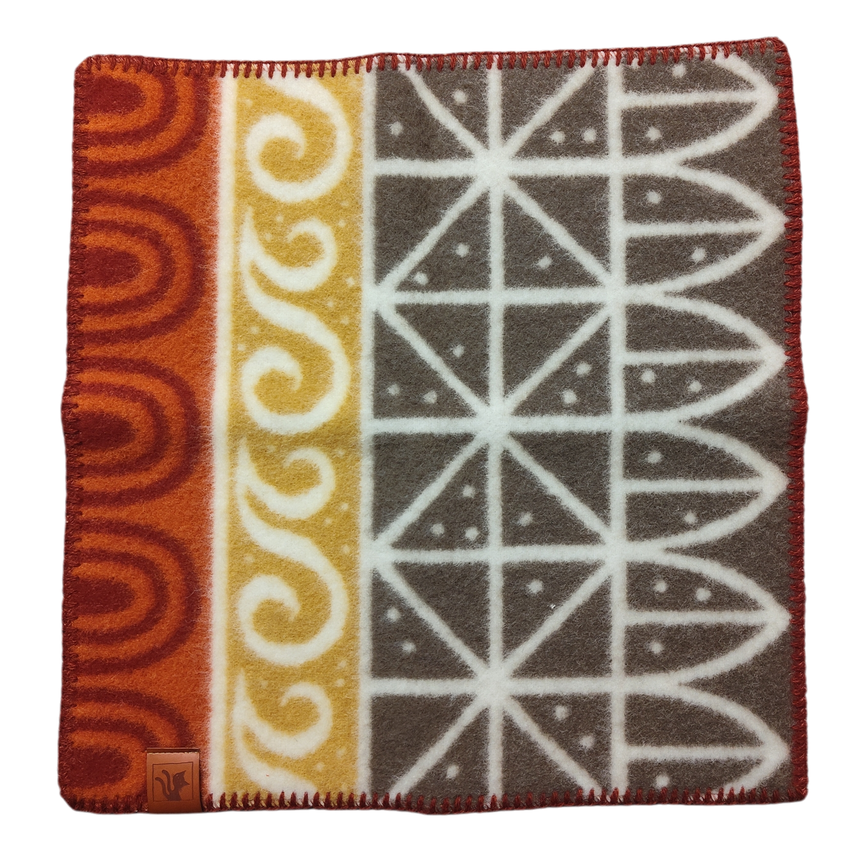 Wool Seat Pad: Uppsala Rust by Kerstin Landström features geometric and wave patterns in red, yellow, and gray. Made from OEKO-TEX certified lambswool for premium softness, it includes a leather tag in one corner.