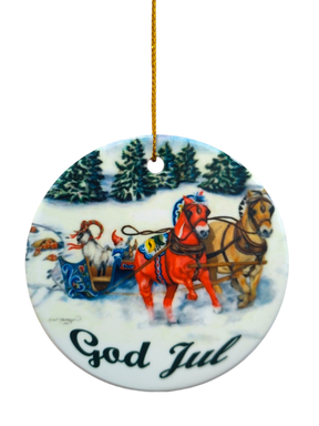 Ornament: Dala Horse and Norwegian Fjord Ceramic Ornament with an illustration of Norwegian Fjord horses pulling a sleigh in snowy pines, plus "God Jul" text at the bottom.