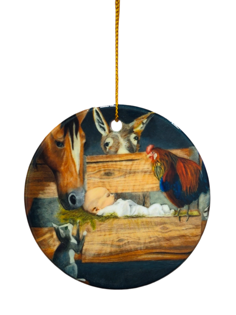 The Ornament: Manger Scene with Barn Animals and Baby Jesus Ceramic Ornament features baby Jesus in a manger, surrounded by a horse, donkey, rooster, and goat, with a gold hanging string at the top.